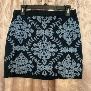 Dark blue embroidered mini skirt